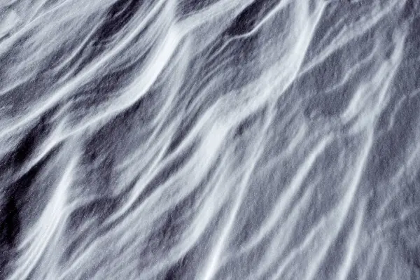 Natural snow texture. Wind sculpted patterns on snow surface. Arctic, Polar region.
