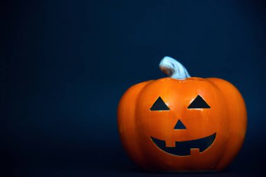  Halloween pumpkin over blue background with copy spac