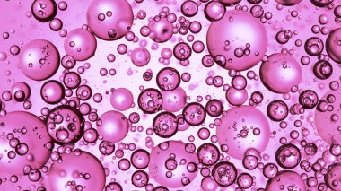 Açık Pembe Arkaplanda Taşıyıcı Kabarcıklar, makro çekim.