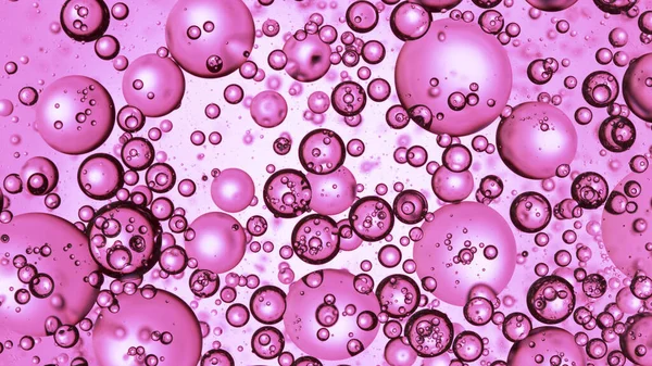 Blasen Auf Hellrosa Hintergrund Bewegen Makroaufnahme — Stockfoto