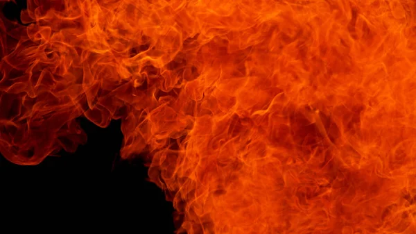 黒い背景での火災の爆発 クローズアップ — ストック写真