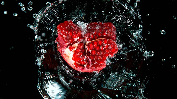 Fresh Pomegranate Falling Water Black Background — Stock Photo, Image