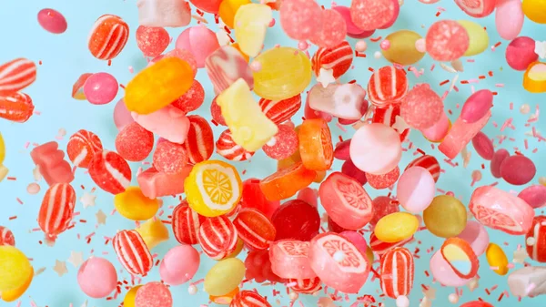 stock image Freeze motion of flying various kind of candies. Colored abstract sweet background.