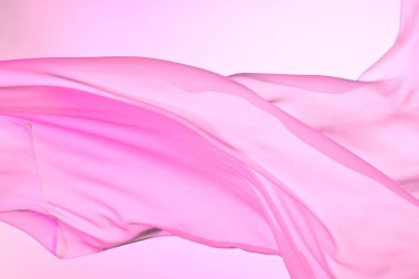 Dalgalanan pembe ipek kumaş, yumuşak dalgalara sarılı renkli kumaş boş yatak örtüsü