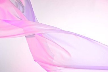 Dalgalanan pembe ipek kumaş, yumuşak dalgalara sarılı renkli kumaş boş yatak örtüsü