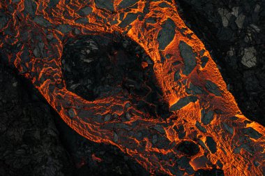 Aerial view of the texture of a solidifying lava field, close-up clipart