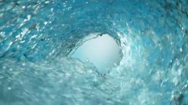 Açık mavi arkaplanda su dalgasının süper yavaş çekimi. 1000 FPS 'te Yüksek Hız Sineması Kamerası' nda çekildi.