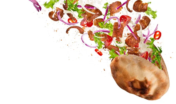Nærbilde Kebabsmørbrød Med Flygende Ingredienser Frysebevegelse – stockfoto