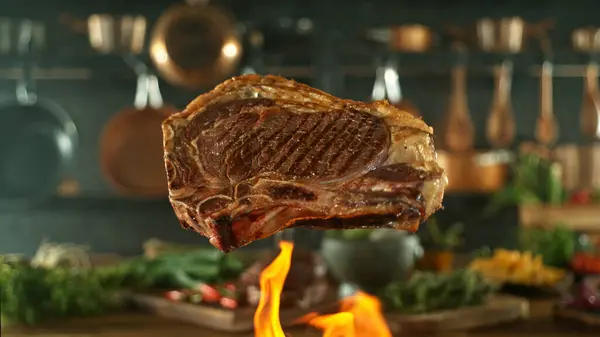 Close Tasty Beef Steak Flying Cast Iron Grate Fire Flames — Stock Photo, Image