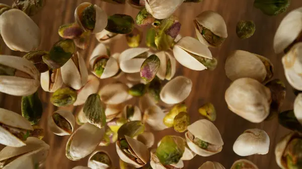 Falling Pistachio Nuts Close Wide Super Macro Shot Royalty Free Stock Images