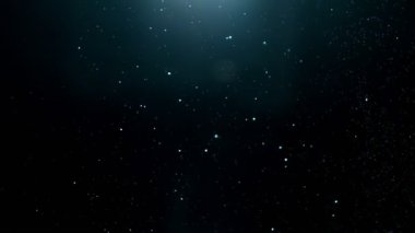 Siyah zemin üzerinde ışıldayan parçacıkların süper yavaş çekimi. Sığ odak derinliği. Yüksek hızlı sinema kamerası, 1000 fps..