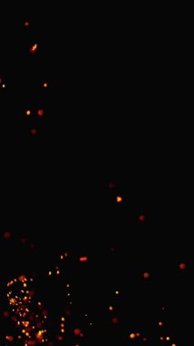 Siyah arka planda izole edilmiş süper yavaş kıvılcımlar. 1.000 fps hızla yüksek hızlı sinema kamerasıyla çekildi.