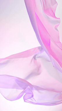 Pastel rengi şeffaf ipek kumaş rüzgarla akıyor, süper yavaş çekim. Yüksek hızlı sinematik kamerada 1000 fps hızla çekilmiştir..
