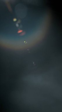 Kaplama veya geçiş için gerçek mercek parlamasının soyut arkaplanı