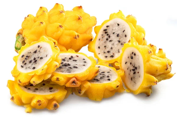 Yellow dragon fruit and dragon fruit slices isolated on white background.