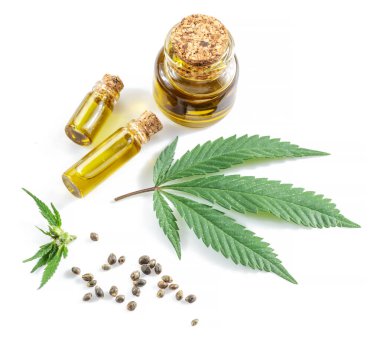 Cannabis leaves, seeds and hemp oil isolated on white background. Close up. clipart