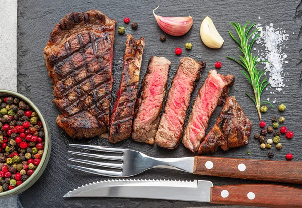 Grilled Delicious Ribeye Steak Slices Some Seasonings Black Slate Serving —  Fotos de Stock