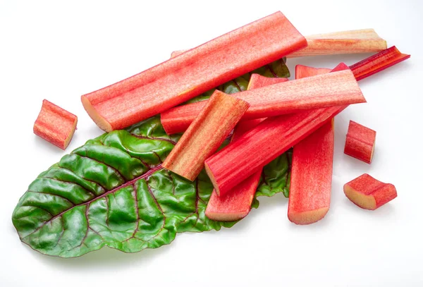 Red Rhubarb Stems Cuts Rhubarb Leaves Isolated White Background — Stock Photo, Image