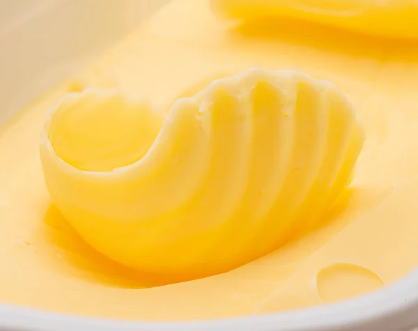 Enrolar Manteiga Sobre Pedaço Manteiga Closeup Fundo Alimentar — Fotografia de Stock