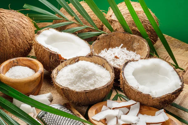 Fresh Opened Coconuts Coconut Slices Flakes Coconut Leaves Wooden Table — Stock Photo, Image