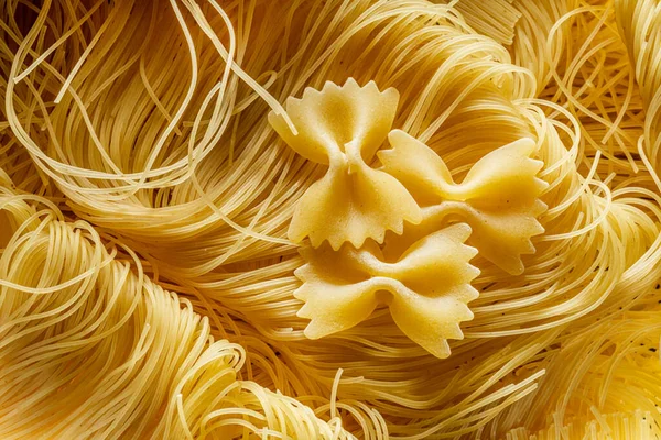 Italiaanse Pasta Vermicelli Farfalle Close Voedselachtergrond — Stockfoto