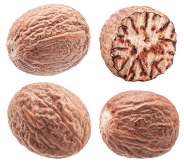 Beyaz arka planda Nutmeg tohumları. Dosya kırpma yolları içeriyor.
