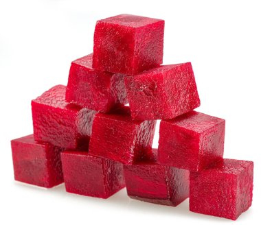 Raw red beetroot cubes arranged as pyramid isolated on white background.  clipart