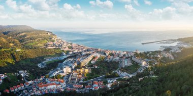 Drone aerial view on Sesimbra, fishing town in Setubal district in Portugal. clipart