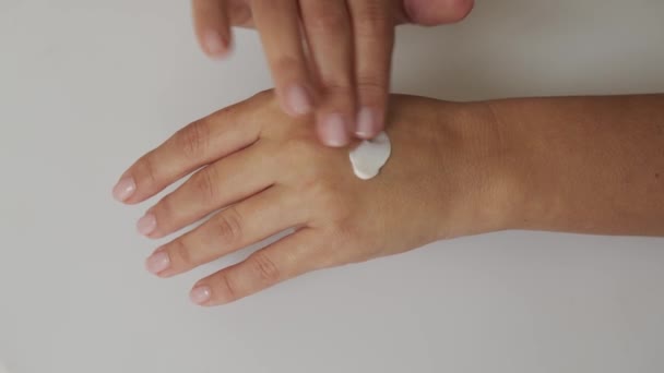 Woman Slowly Lubricates Her Hand Cream Massaging Her Hands Self — Stock Video