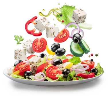 Fresh vegetables and feta cheese falling down into the white plate isolated. File contains clipping paths. clipart