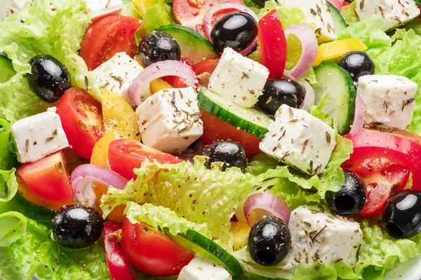 Yunan salatası malzemeleri kapanıyor. Lezzetli yemek geçmişi.