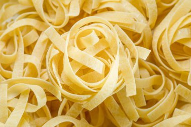 İtalyan makarna tagliatelle yakın plan. Gıda arkaplanı.