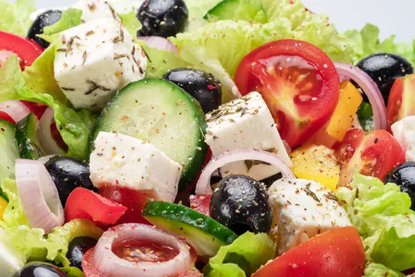 Yunan salatası malzemeleri kapanıyor. Lezzetli yemek geçmişi.
