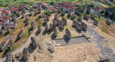 Drone aerial view on granaries near the Castle de Lindoso, medieval castle in the district of Viana do Castelo in Portugal. clipart