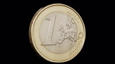 Siyah arkaplanda bir avro kendi ekseni etrafında dönüyor.