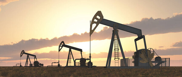 Oil pumps at sunset