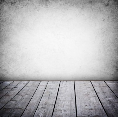 Grunge duvar ve ahşap yerde, bir oda dolusu iç panelli.