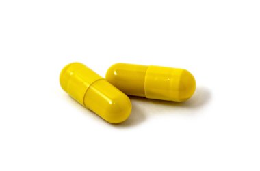 tıbbi kapsüller beyaz arkaplanda izole