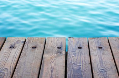 wooden old table top and sea space