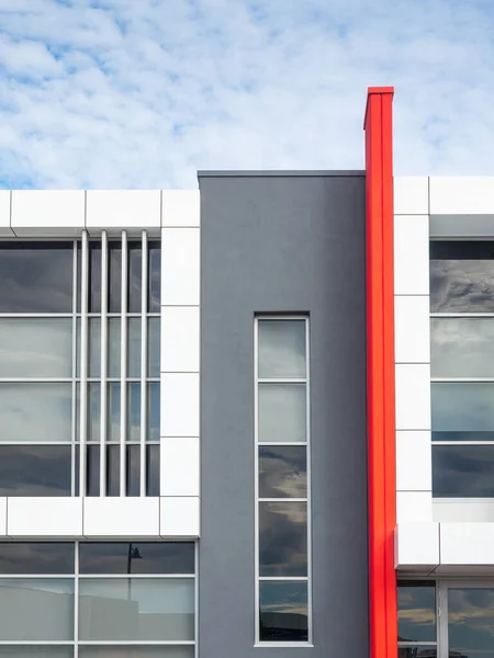 stock image PERTH, AUSTRALIA  MAY 21, 2023 Red, grey and white architecture in an industrial area in Perth, Western Australia.