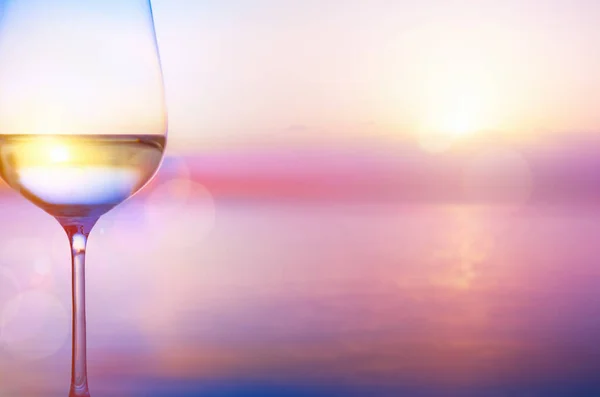 white wine on the summer sea background