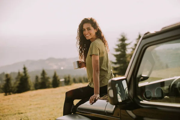 Pretty Young Woman Relaxing Terrain Vehicle Hood Countryside — Stock Photo, Image