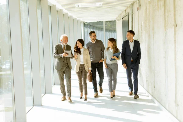 Group Corporate Business Professionals Walking Office Corridor Sunny Day — Stock Photo, Image