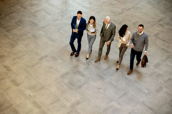 Group Young Senior Business People Walking Office Hallway Captured Aerial Royalty Free Stock Photos