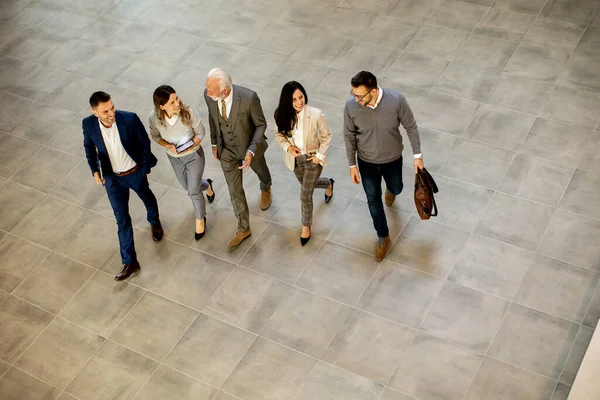 Group Young Senior Business People Walking Office Hallway Captured Aerial Stock Picture