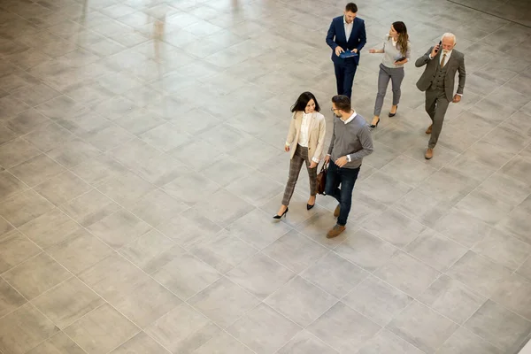 Group Young Senior Business People Walking Office Hallway Captured Aerial Royalty Free Stock Images