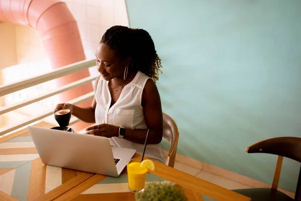 Pretty Young Black Woman Drinking Coffee While Working Laptop Cafe — Stock Photo, Image