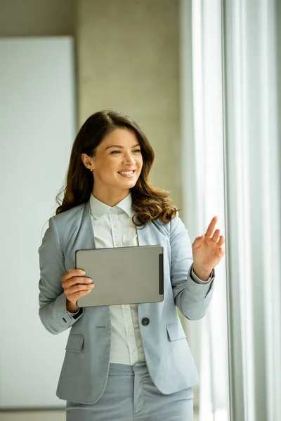 Pretty Young Woman Working Digital Tablet Office Window — Stock Photo, Image