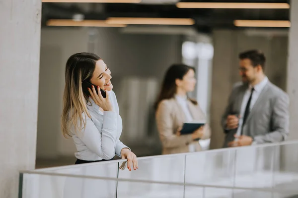 Young Business Woman Standing Mobile Phone Office Hallway — Stock Photo, Image