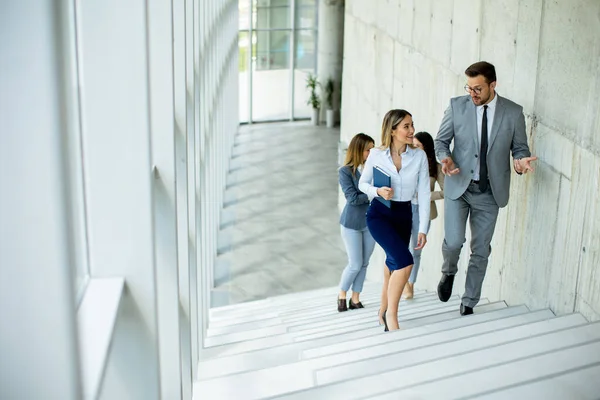Young Startup Team Have Discussion While Climbing Stairs Office Corridor — Stock Photo, Image